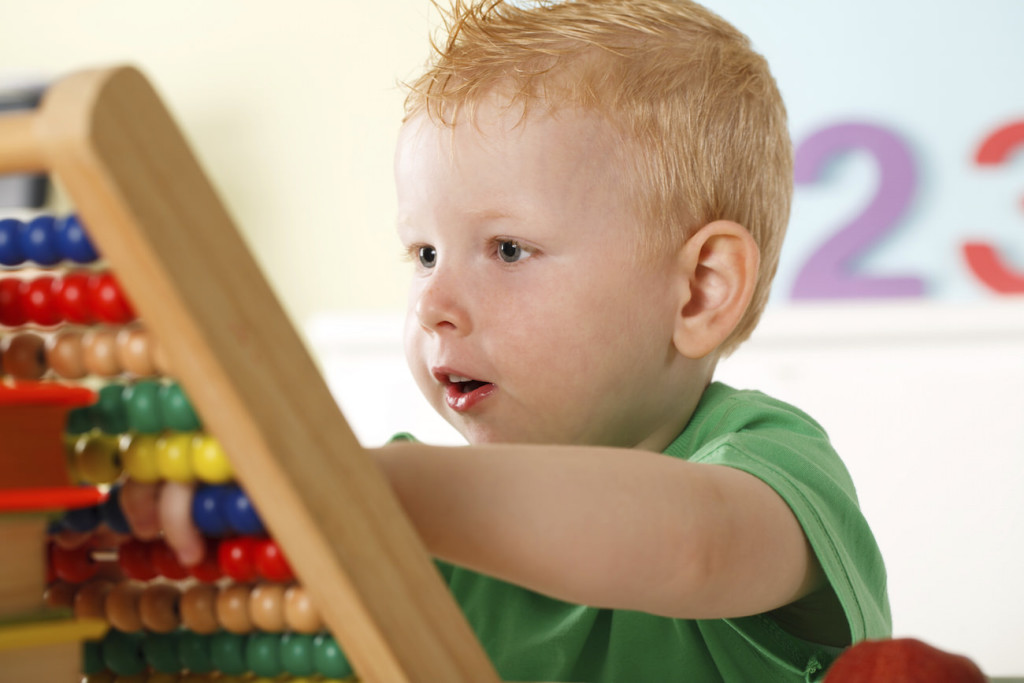 Little boy with abacus