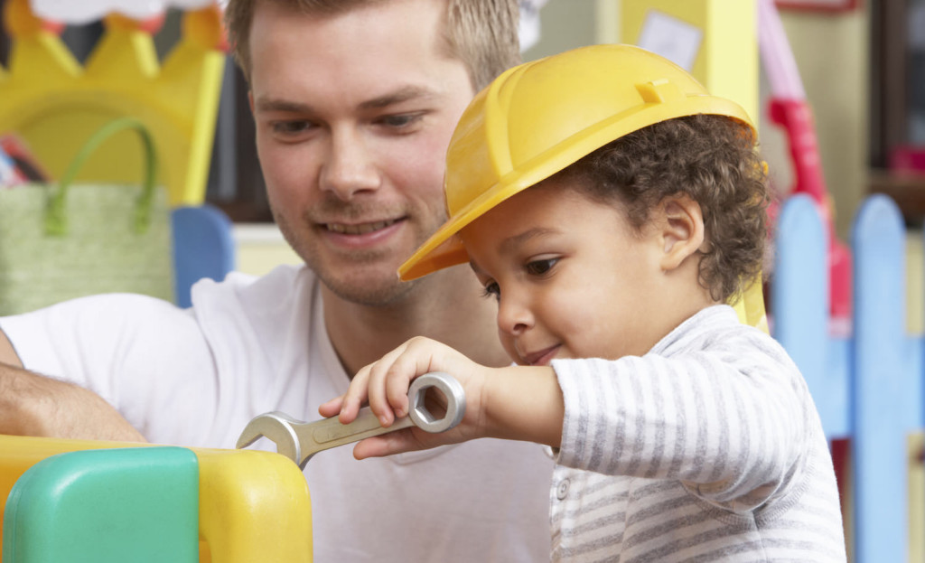 Man with children playing together